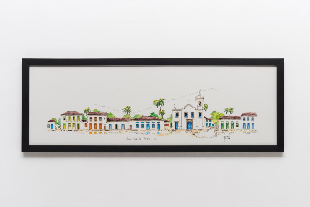 Quadro do Quadrado de Trancoso, Bahia, com moldura preta em parede branca
